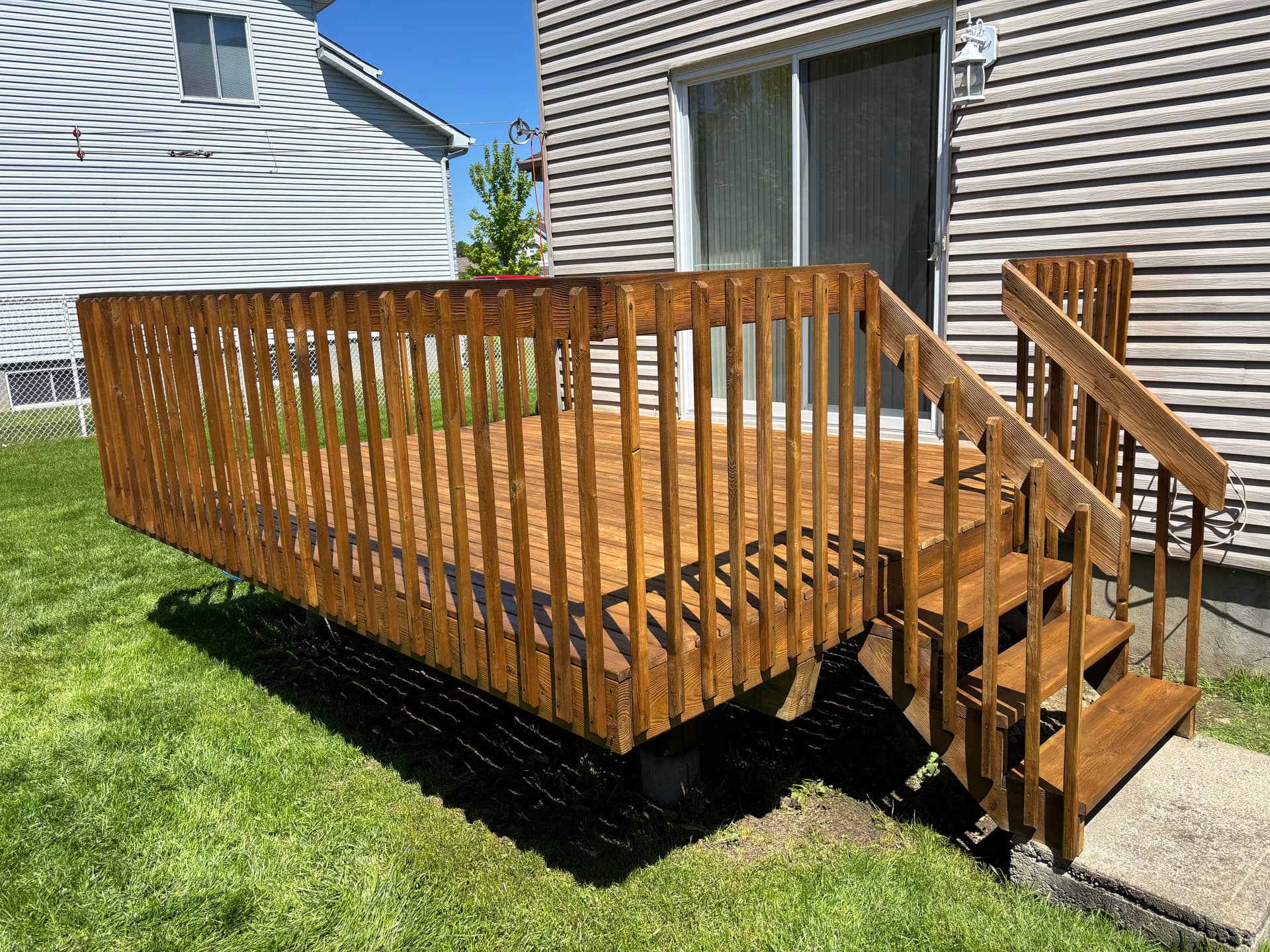 Deck stained with Golden Pine